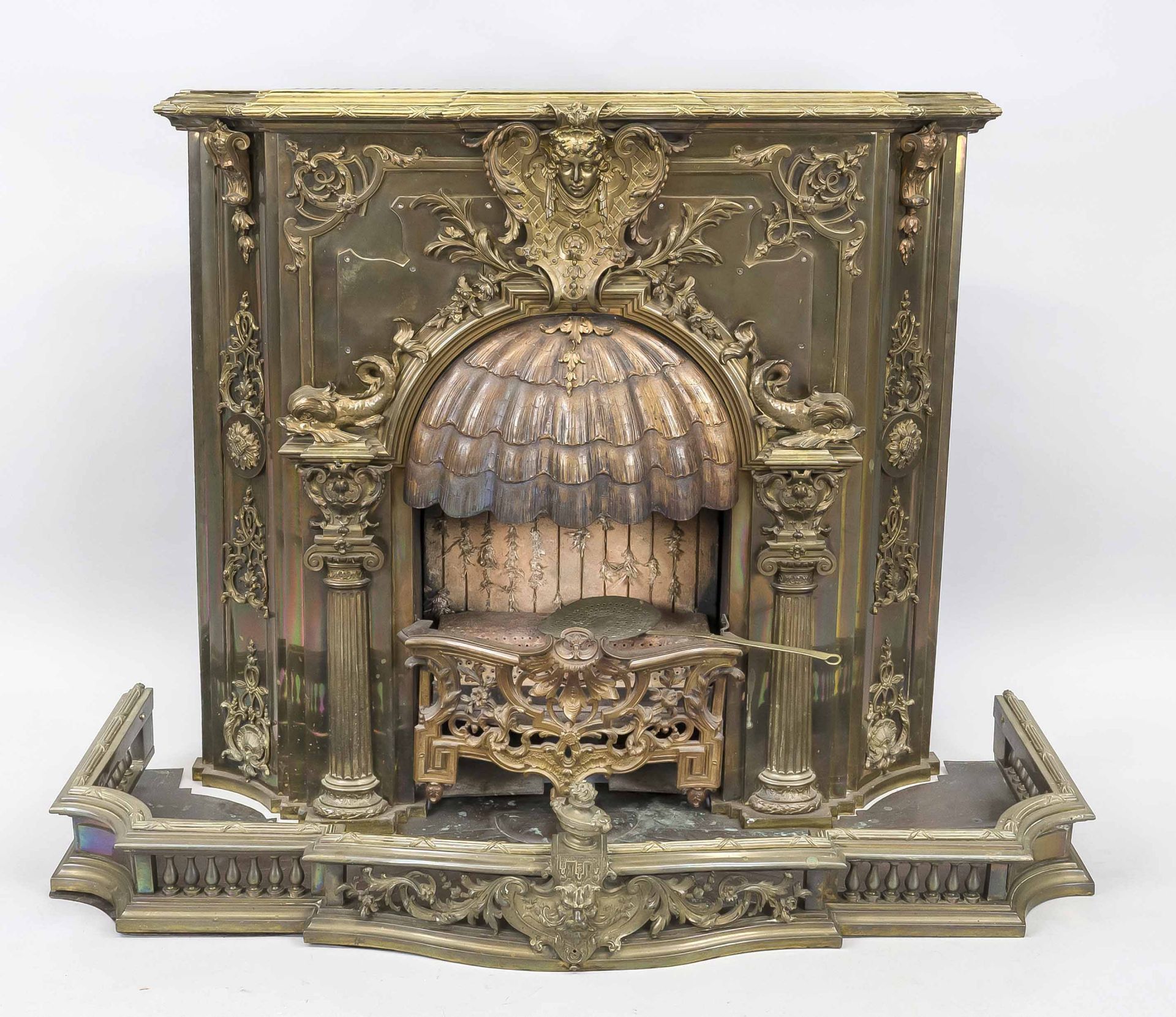 Spirit or gas fireplace?, late 19th century, brass, bronze and iron. Lavishly decorated and