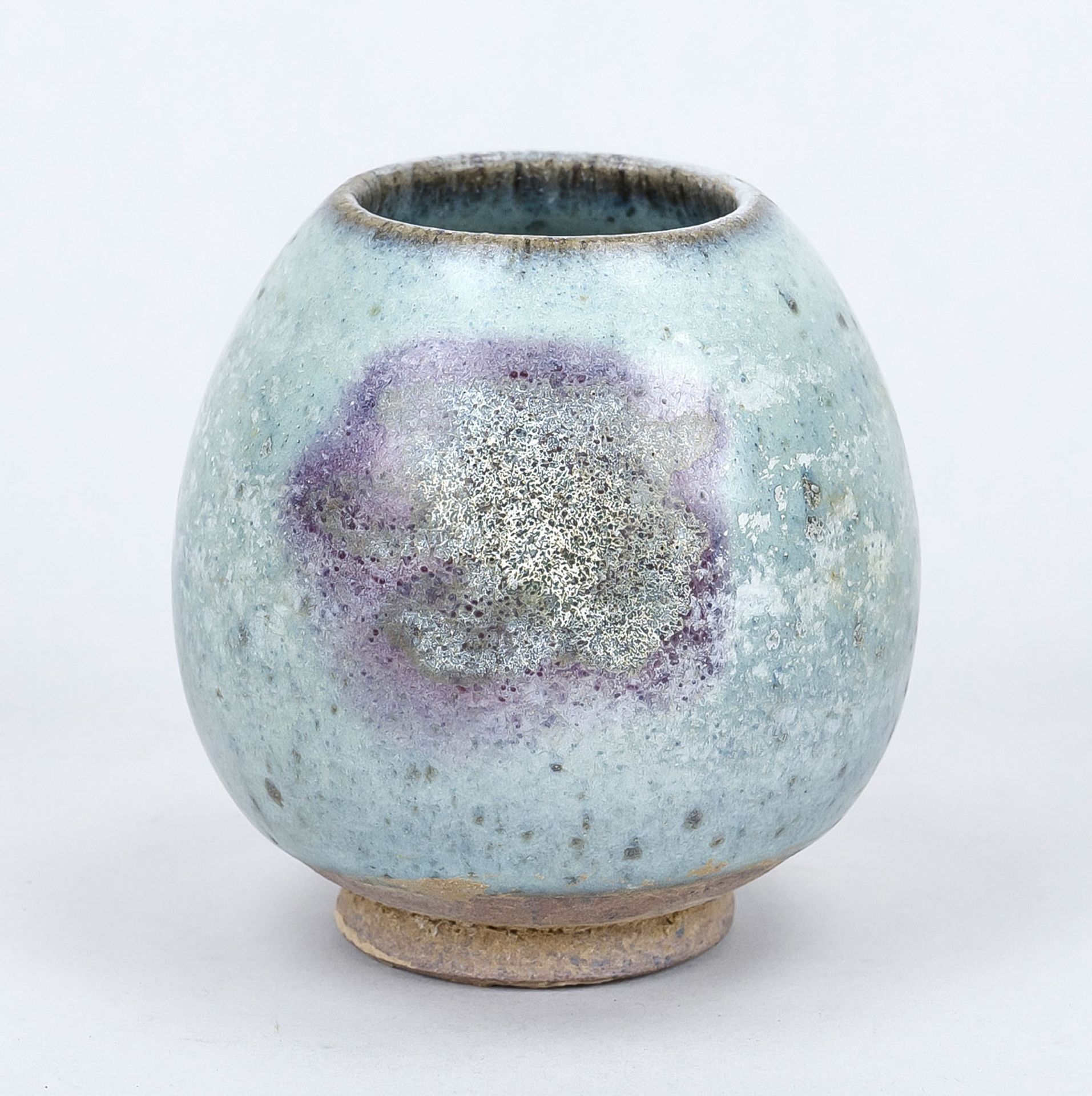 Ovoid Jun ware cup, China, exact age uncertain. Light blue to gray glaze with a purple splash,