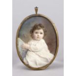 Oval miniature, England, early 20th century, polychrome tempera painting. Toddler in a white dress