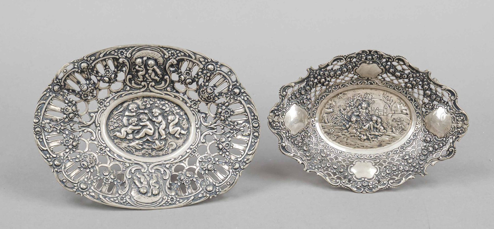 Two oval openwork baskets, German, 20th century, silver 800/000, each with openwork flag with floral