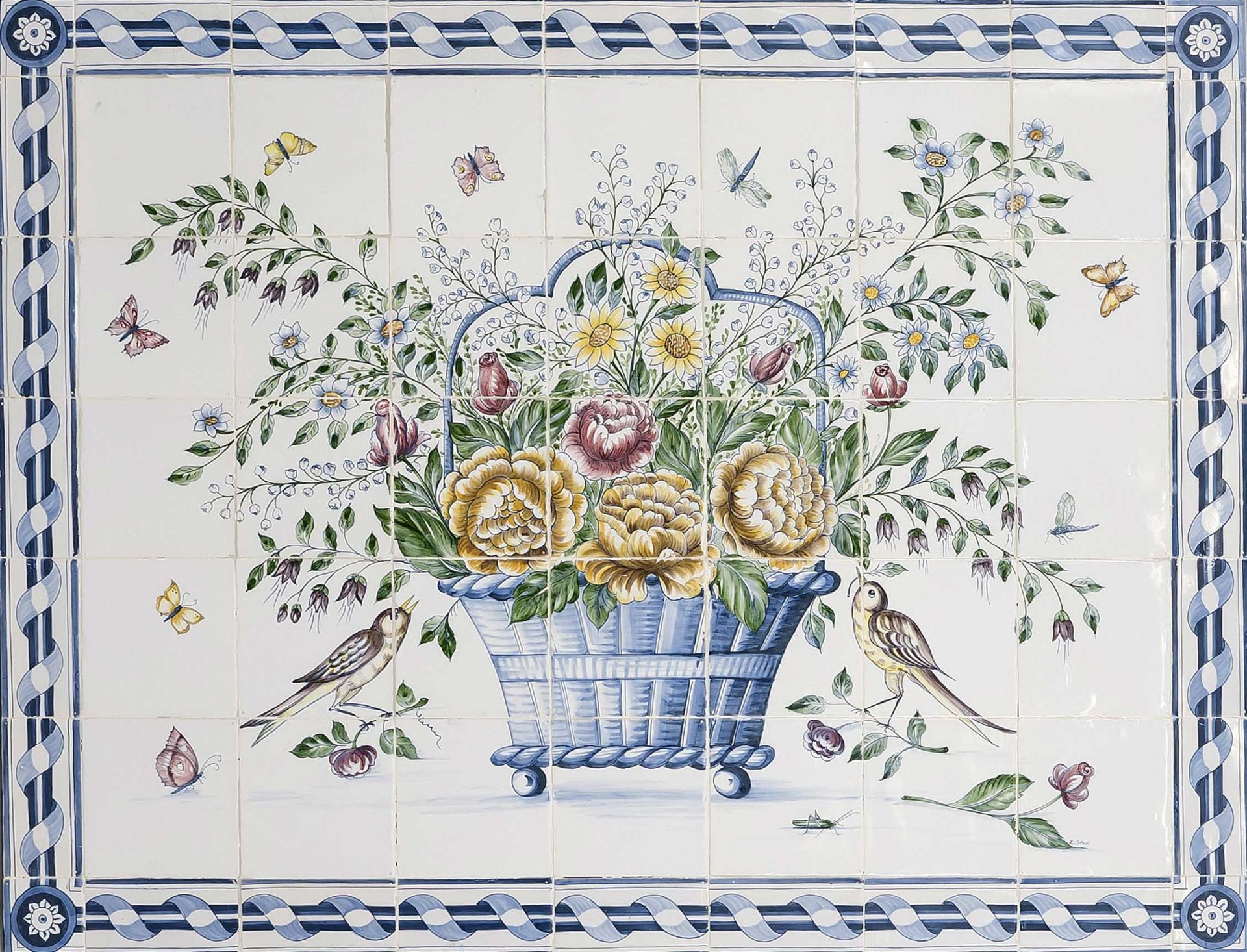 Tile picture, probably Holland. Large flower basket with birds and insects in polychrome and