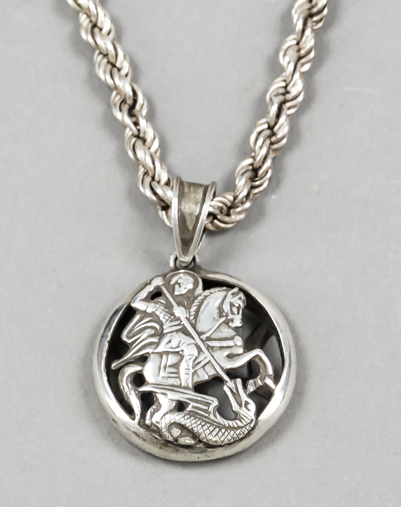 Round pendant, 20th century, silver 875/000, hallmark Jerusalem cross, open-worked, front with St.