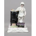 Humorous match holder, late 19th century, polychrome painted and glazed porcelain. Young lady
