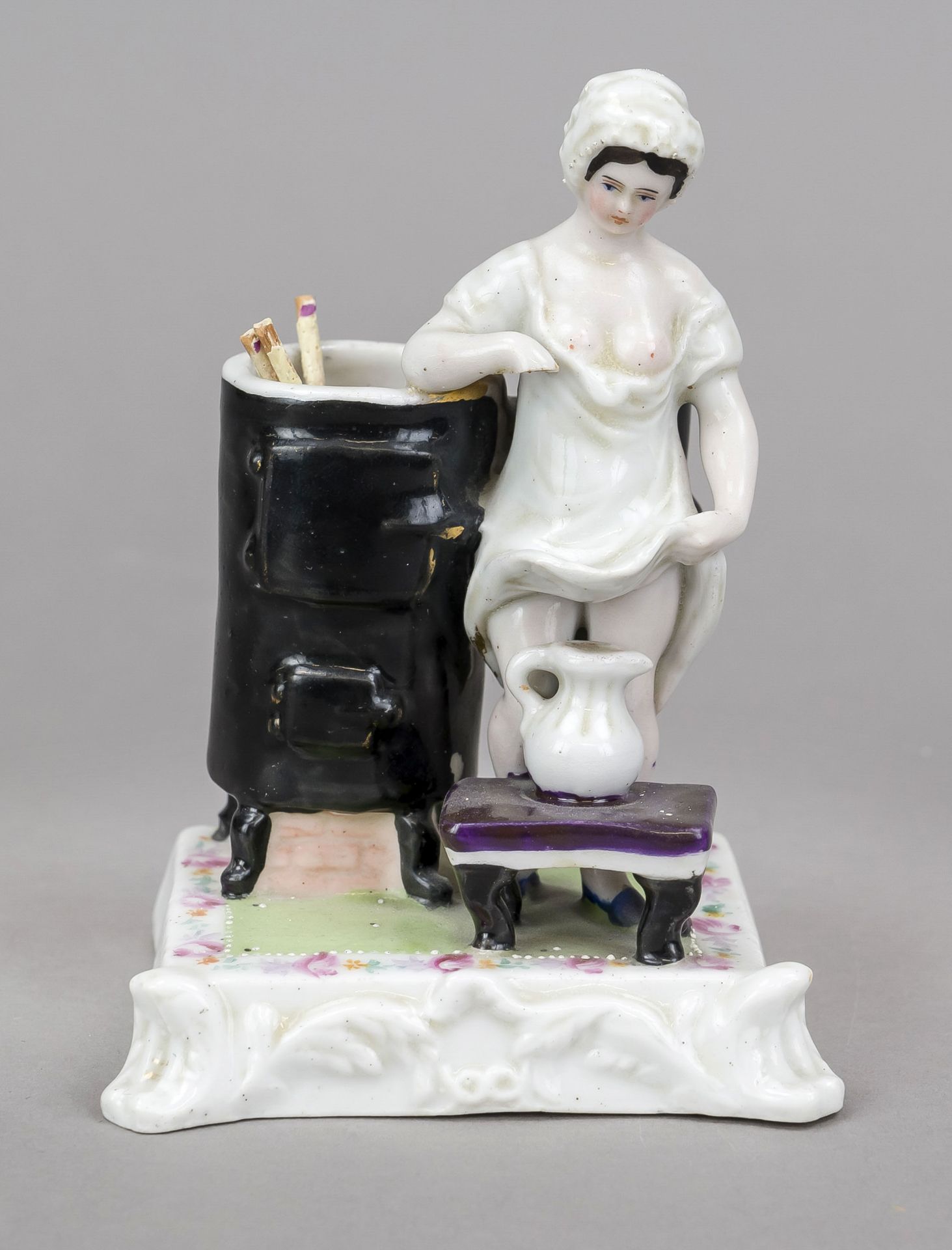 Humorous match holder, late 19th century, polychrome painted and glazed porcelain. Young lady