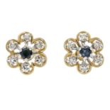 Flower stud earrings GG/WG 585/000 with 2 round faceted dark blue gemstones 3.2 mm and 12