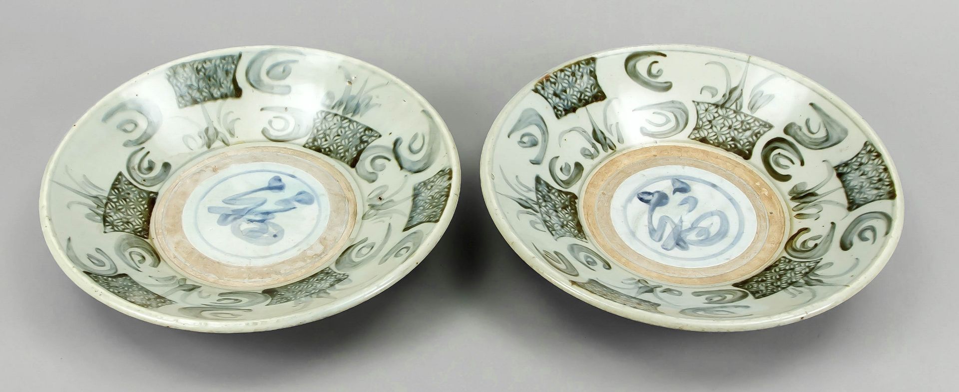 Pair of Swatow ware plates, China, Ming period. Thick-walled ceramic with underglaze decoration,