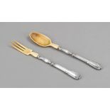 Two-piece salad servers, probably French, silver, unmarked, filled handles with ornamental relief