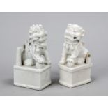 A pair of Blanc de Chine guardian figures, China (Dehua), probably 18th century, both heavily