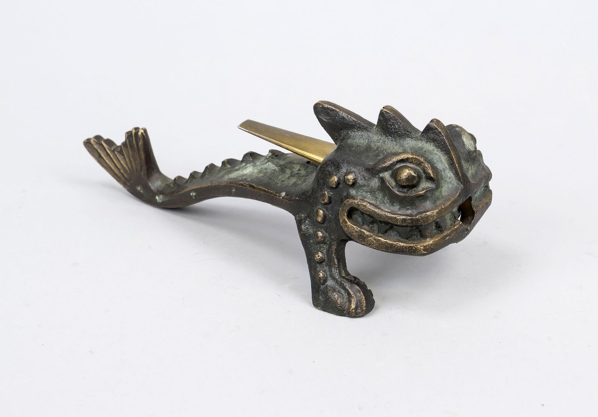 Table lighter, 2nd half 20th century, patinated brass. Sea monster or dragon on two front legs, a