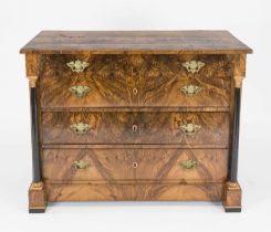 Biedermeier chest of drawers, circa 1820, walnut, four drawers flanked by ebonized full columns,