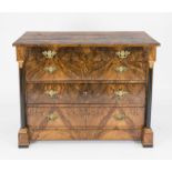 Biedermeier chest of drawers, circa 1820, walnut, four drawers flanked by ebonized full columns,