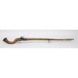 Oriental flintlock rifle, 18th/19th century, barrel and lock probably originally English, numerous