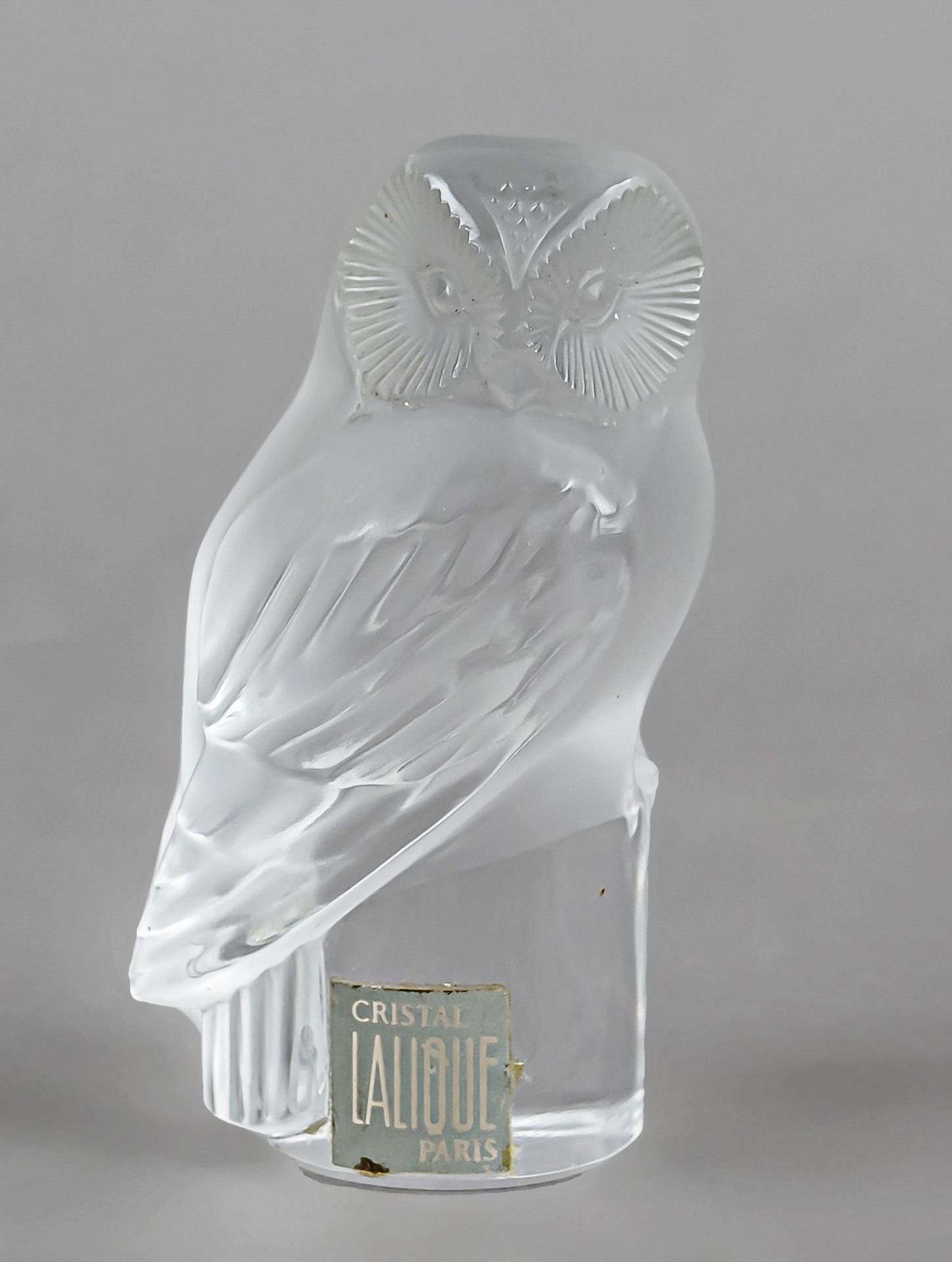 Owl, France, 2nd half 20th century, Lalique, on a round base, clear, predominantly frosted glass,