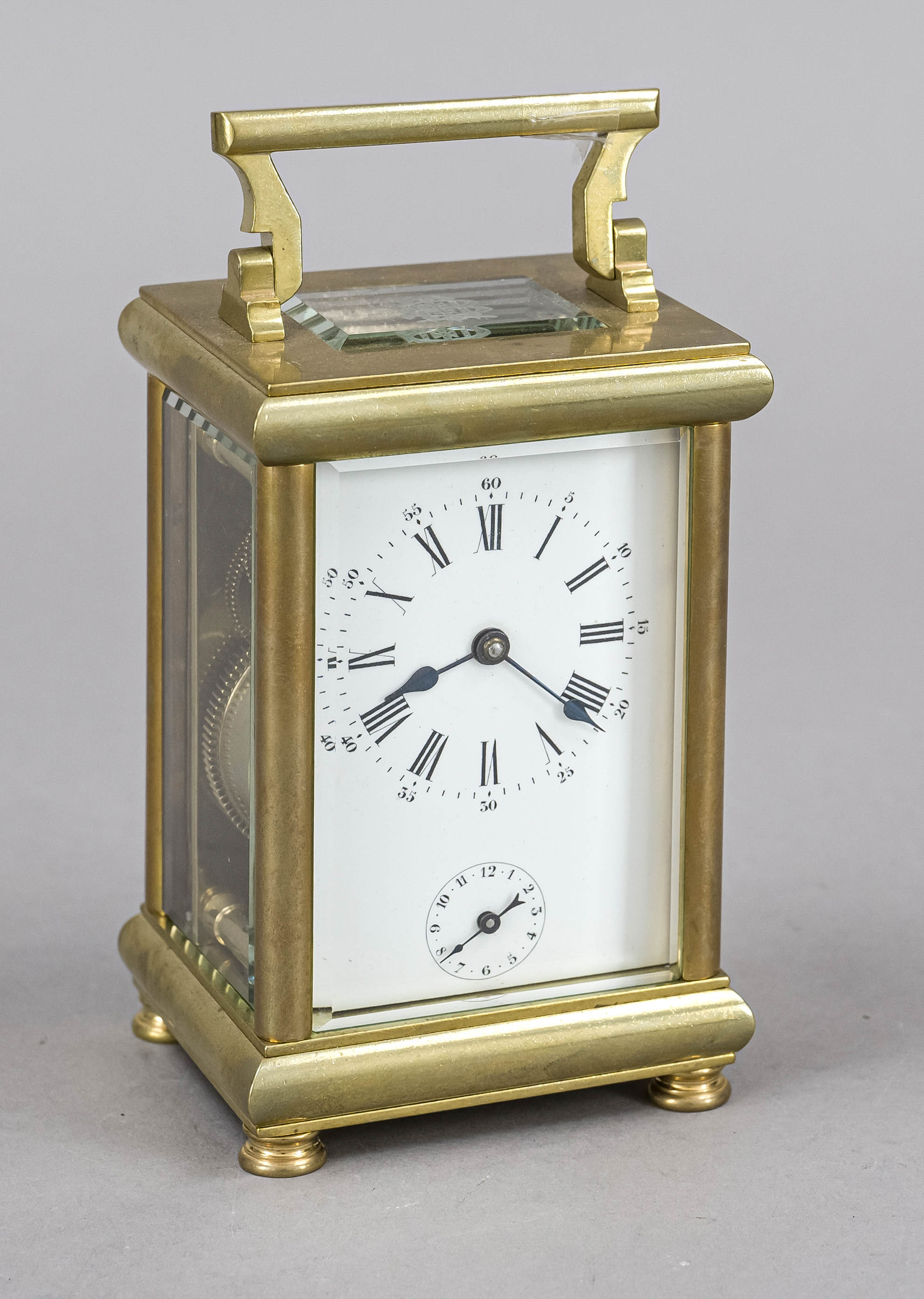 Travel alarm clock, France 19th century, brass, with top handle, faceted glass on all sides, faceted