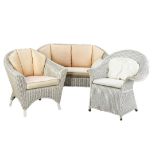 Three-piece rattan set in retro-chic style, 20th century, couch and two armchairs, signs of wear,