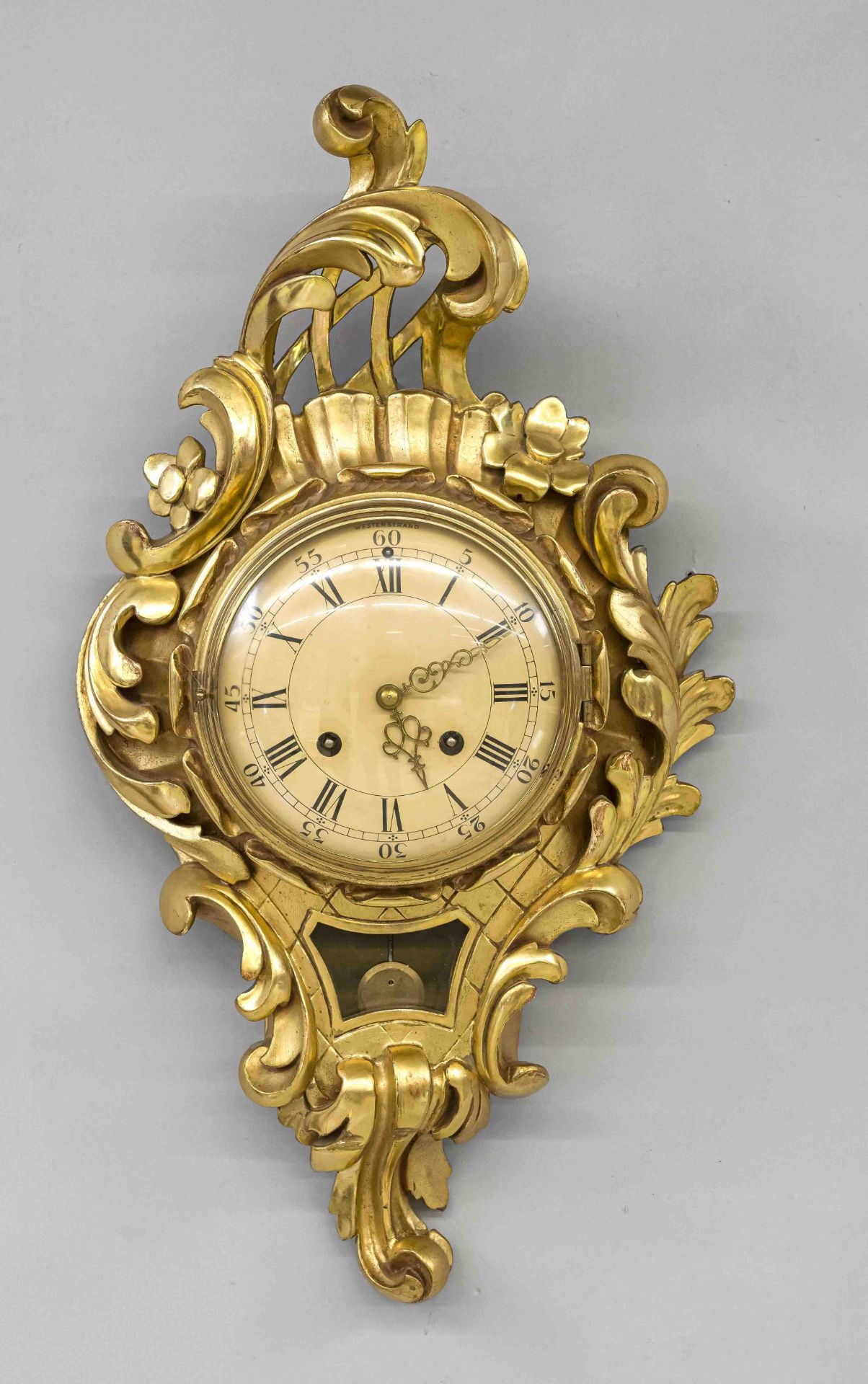 Cartel clock, wood, gilded leaf on red ground, 1st half 20th century, decorated with rocailles, gold