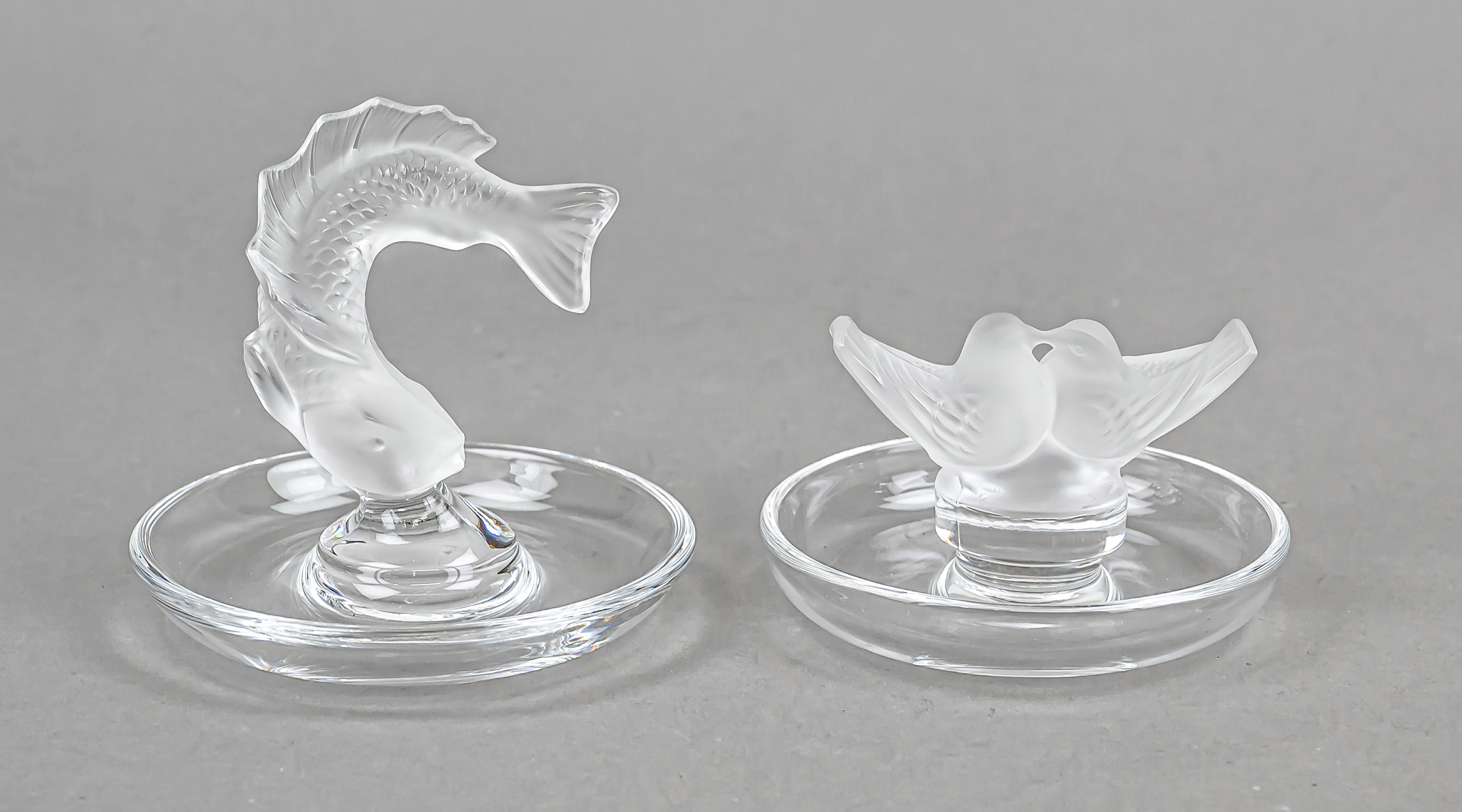 Two small bowls, France, 2nd half 20th century, Lalique, round, flat shape, figural central handles,