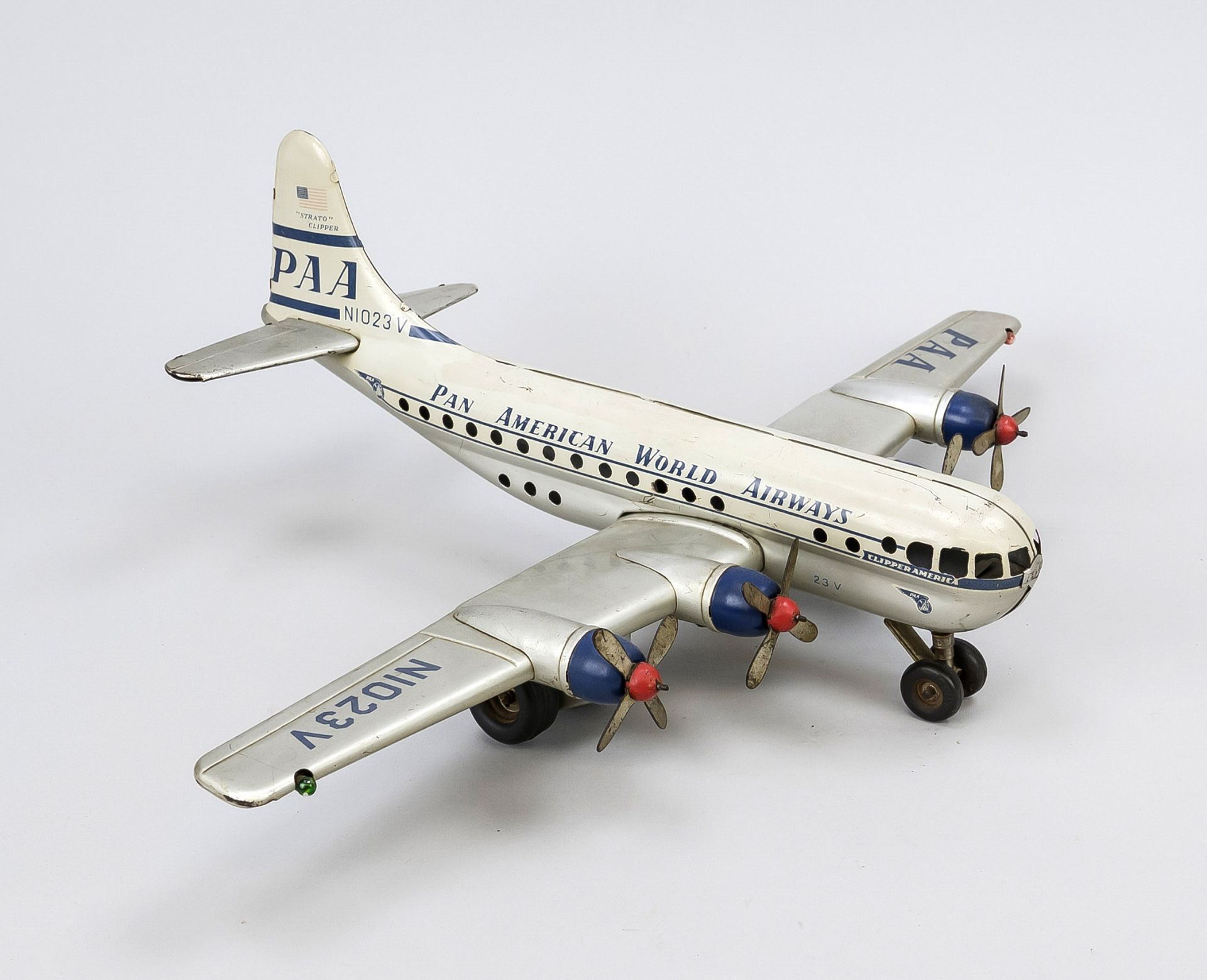 Tin airplane toy Pan Am, mid 20th century. Two propellers, on the side of the fuselage