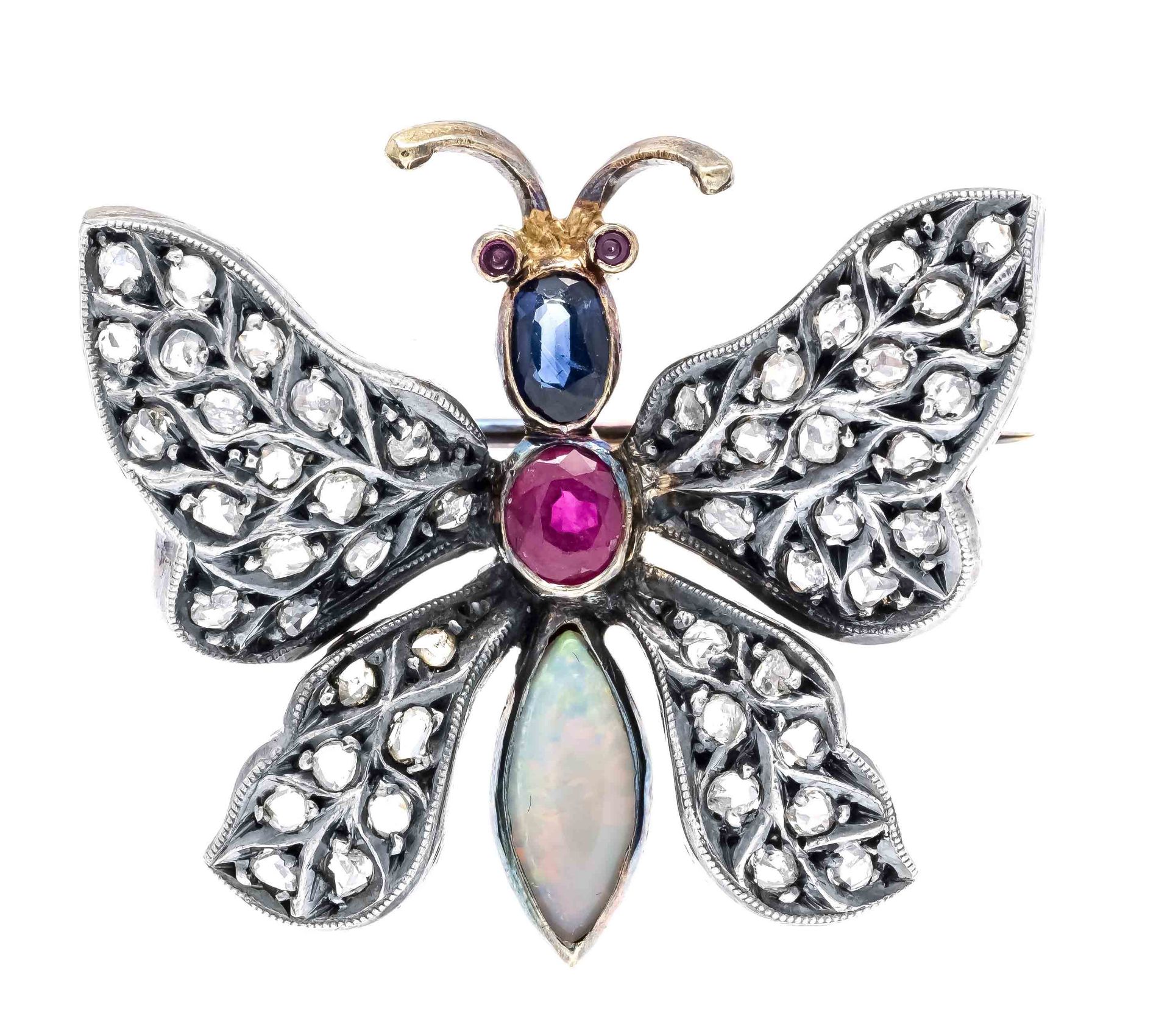 Butterfly brooch, silver 925/000 and GG 800/000, unmarked, tested, with a milky opal cabochon 10 mm,