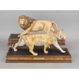 Lion and tiger on pedestals, Franklin Mint, 1989, Figure of a lion, 'Monarch of the Serengeti',