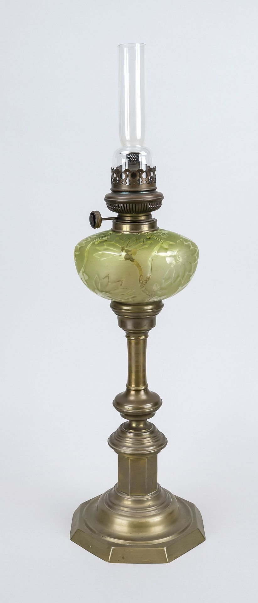 Kerosene lamp c. 1900, brass base with green floral etched vessel, h. 64 cm