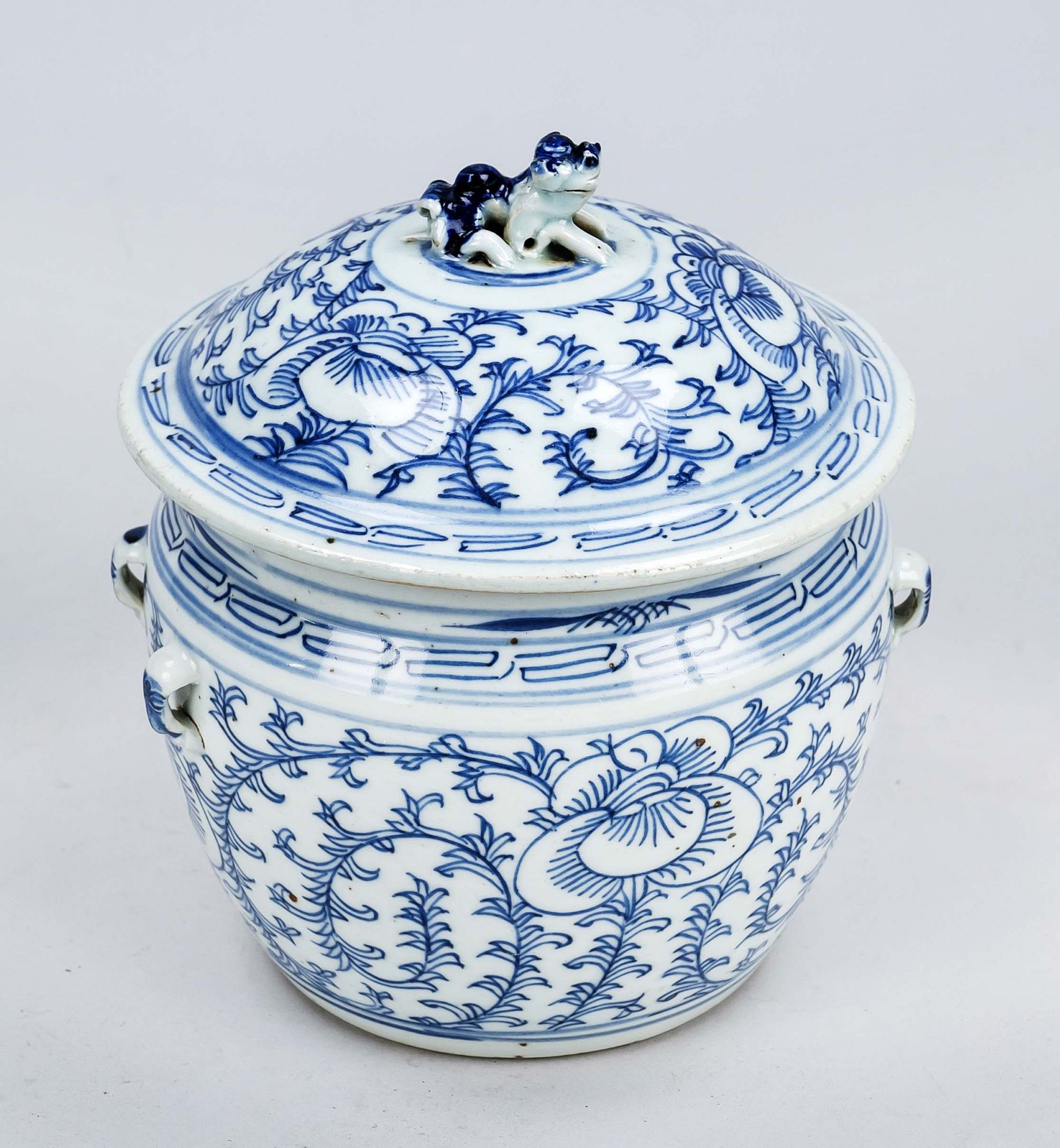 Lidded pot, China, 19th century, bobalt blue lotus tendril decoration, lid with figural knob (