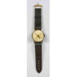 Wall clock 1970 leather strap, with quartz movement, gold-colored dial with black Roman numerals