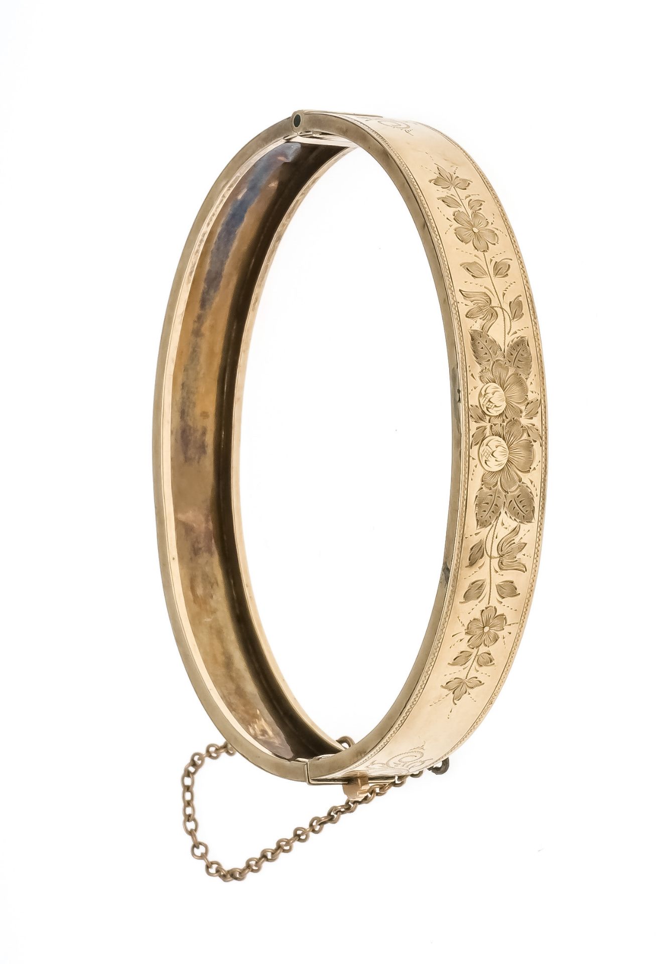 A hinged bangle, circa 1880 RG 585/000 unmarked, tested, the front with fine floral chasing, w. 9.
