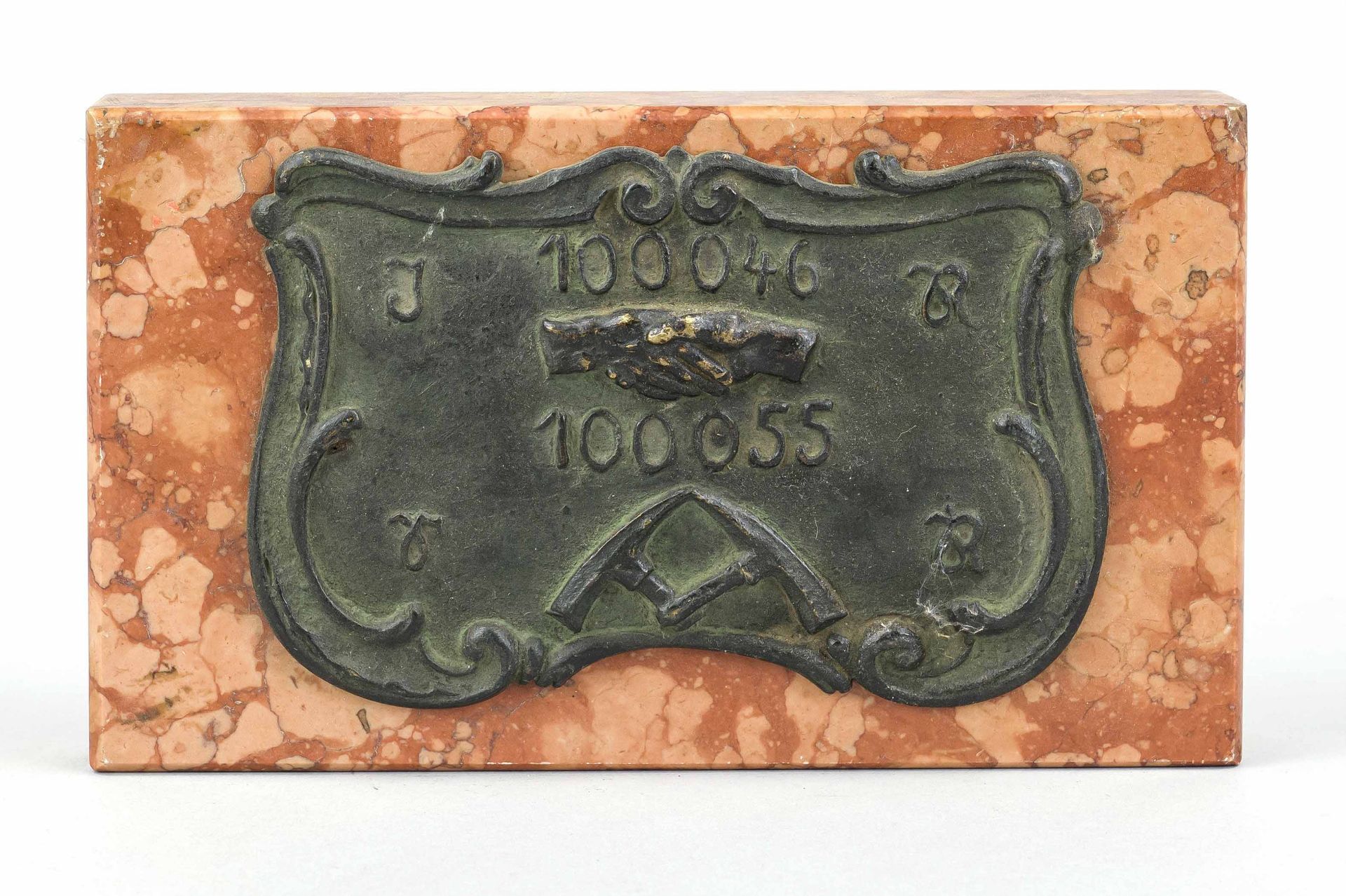 Mining plaque, 1st half 20th century, patinated bronze cartouche with crossed pickaxes, hands and
