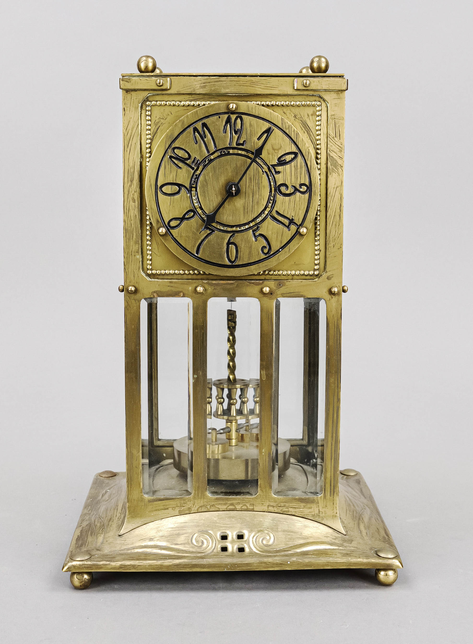 Art Nouveau revolving pendulum clock, c. 1910, gilt brass, with typical Art Nouveau motifs,