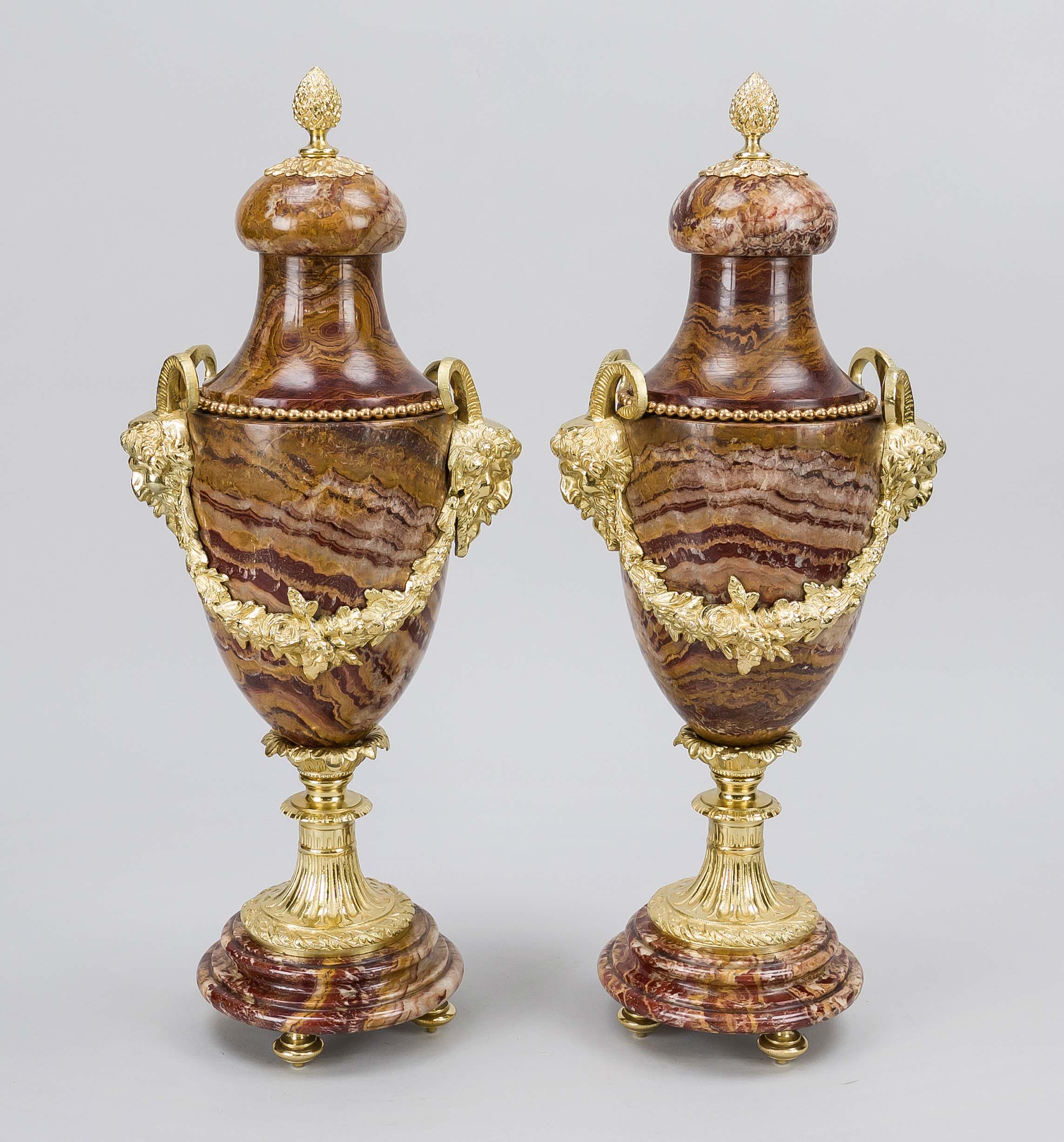 Pair of buck's head decorative vases, 20th century, polished stone and gilded mounting and