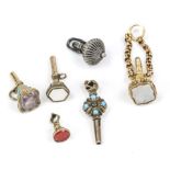 6 antique pocket watch keys, 19th century, set with stones, various stones such as carnelian,