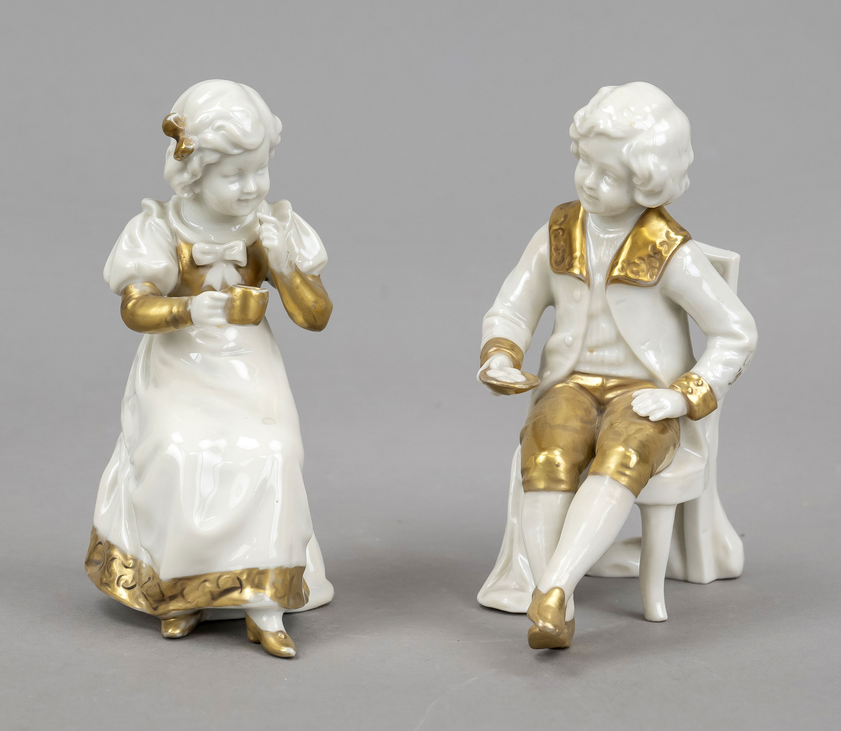 Pair of children, Scheibe-Alsbach, Thuringia, 20th century, two seated figures of children in