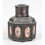 Tea caddy, China late 19th century (late Qing). Faceted pewter body with framed pictures behind