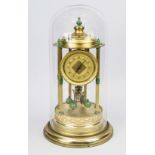 Revolving pendulum clock, annual, 1st half 20th century, in temple form, gilt, polished matt