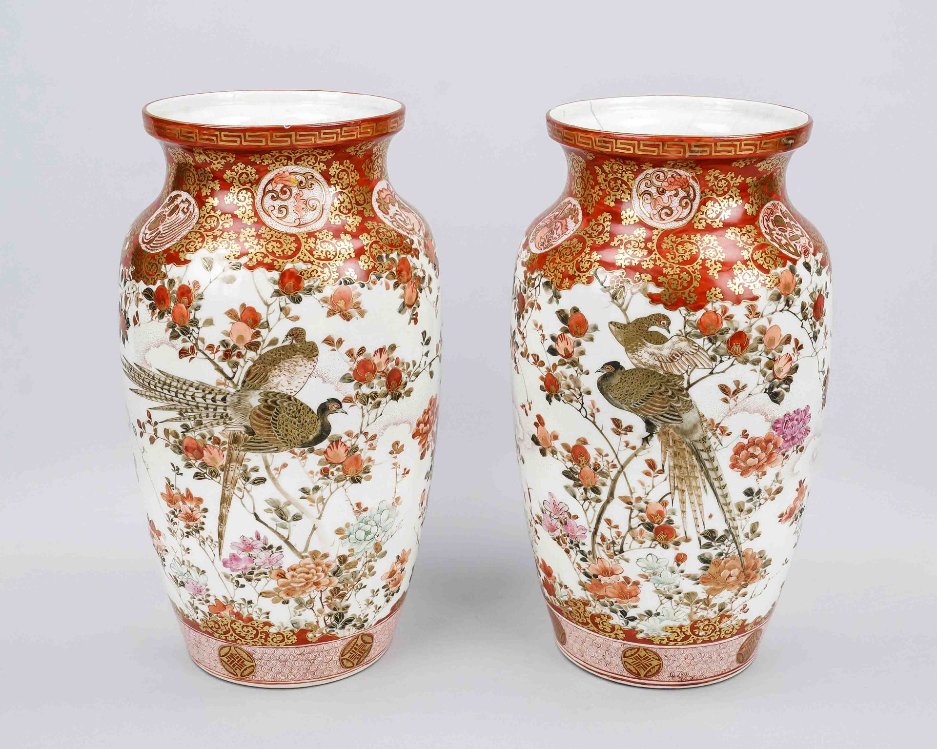 Pair of Kutani vases, Japan, late 19th century (Meiji). Revolving decoration with flying birds among