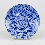 Dragon and phoenix plate, China/Japan, c. 1900. Cobalt blue printed decoration. Wire wall