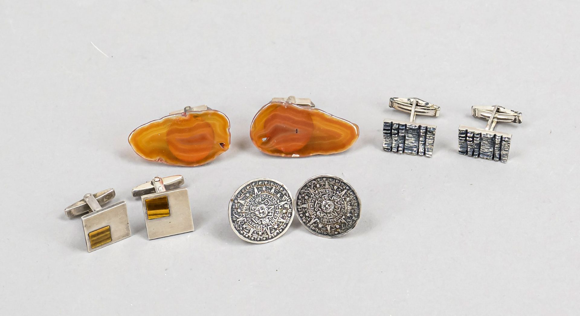 Four pairs of cufflinks, 20th century, various makers, silver of varying fineness, various shapes,