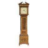 An English longcase clock, circa 1800, indistinctly inscribed on the dial, mahogany veneer with