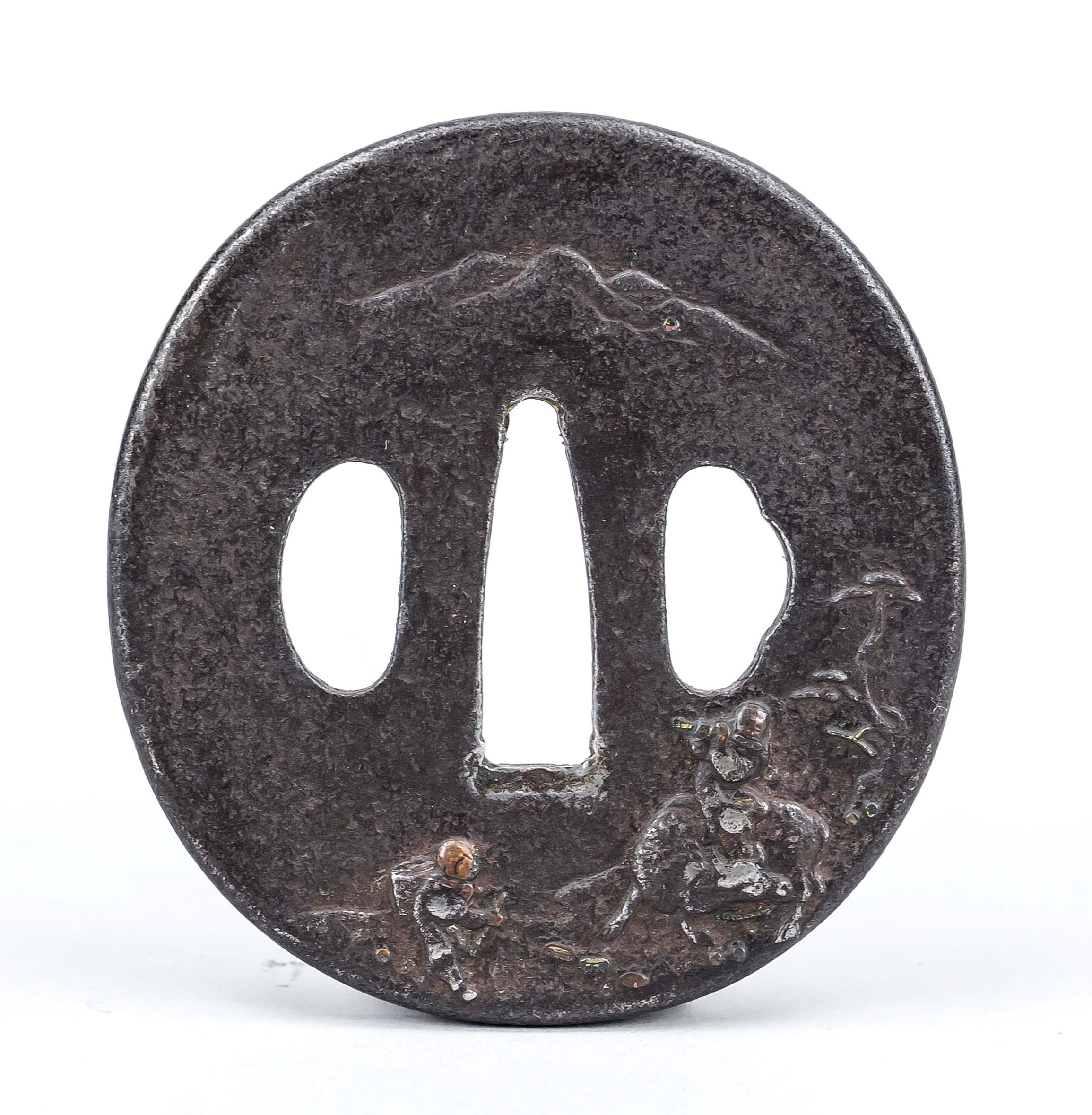 Tsuba, Japan 18th/19th century, Edo period, iron. Relief decoration with boy and water buffalo,