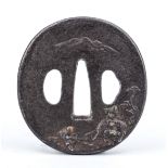 Tsuba, Japan 18th/19th century, Edo period, iron. Relief decoration with boy and water buffalo,