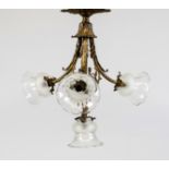 Ceiling lamp, late 19th century, 4 perennial shafts with foliage overlay. Flower-shaped shades of