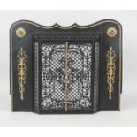 Fireplace porch, late 19th century, painted iron black, brass. Curved panel with decorative