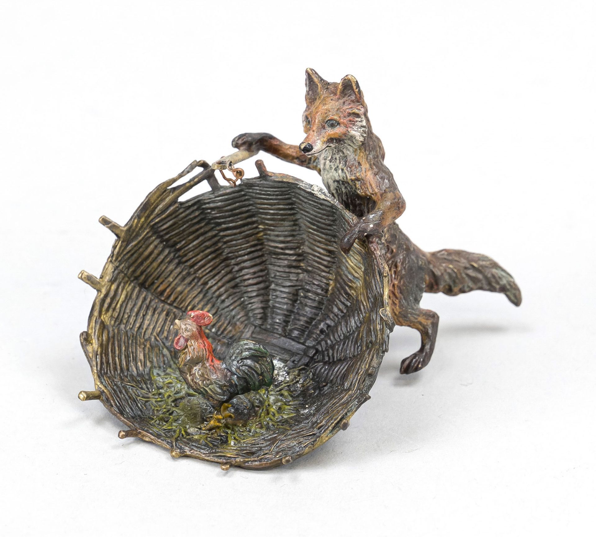 Small bronze in the style of Viennese bronzes, 20th century, fox trying to catch a cock in a basket,