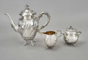 A three-piece coffee pot, German, c. 1900, silver 830/000, the interior partly gilt, each on 4 feet,