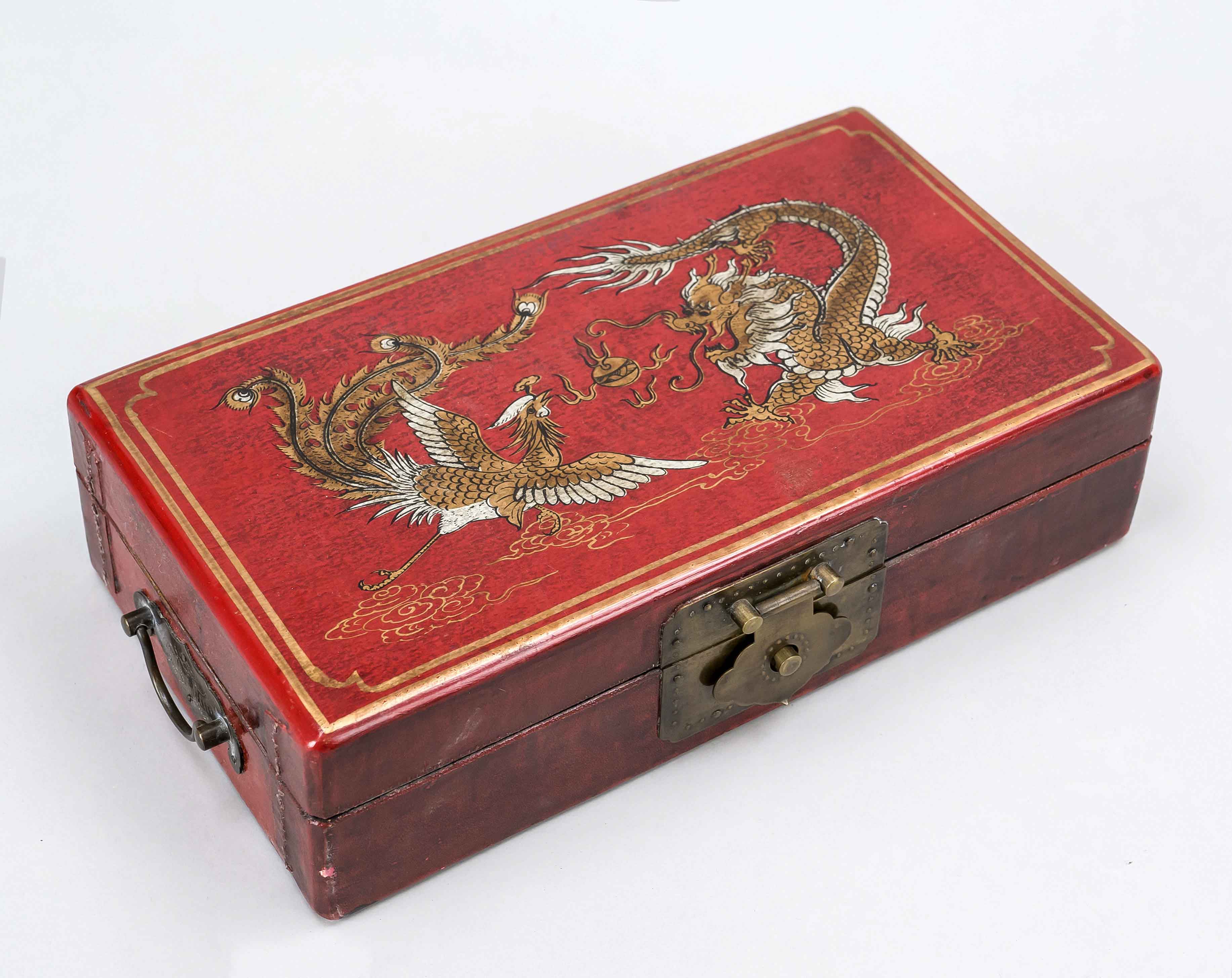 Dragon casket, China, 20th century, wood with red lacquer, partially decorated in gold. Brass