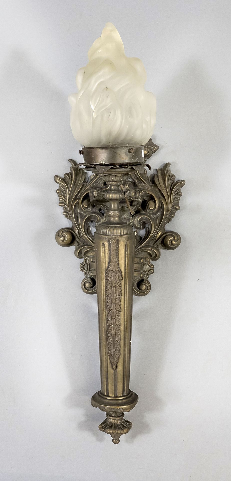 Wall lamp, 20th century, white metal. Open-worked and ornamented wall plinth, with a torch attached.