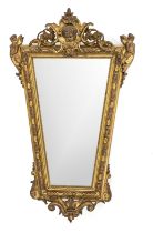 Wall mirror from around 1880, trapezoidal wooden frame, stuccoed and gilded, faceted mirror, 110 x