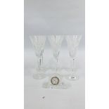 A SET OF SIX WATERFORD CRYSTAL MILLENNIUM FLUTED WINE GLASSES AND WATERFORD CRYSTAL GLASS CLOCK.