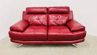 A DESIGNER ITALIAN RED LEATHER TWO SEATER SOFA W 180CM.